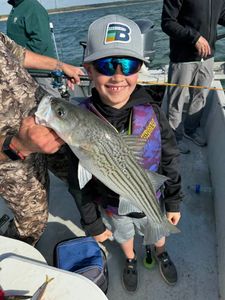 Big smiles, striped bass! 🎣😄