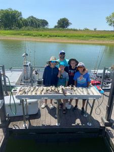 5 people fishing in Madill