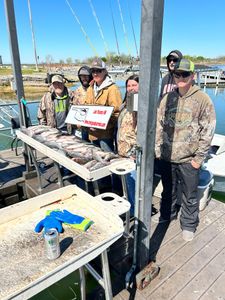 Group of 6 people enjoying a fishing trip in Madill