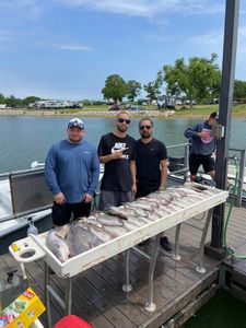 4 people fishing in Madill
