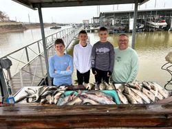 Five people fishing in Madill