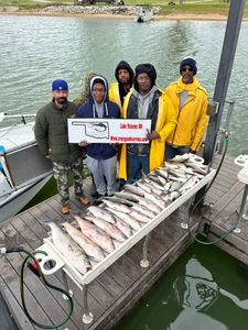 Six people enjoying a fishing trip in Madill