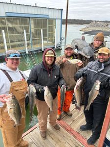 5 largemouth bass, striped bass, and catfish caught while fishing in Madill