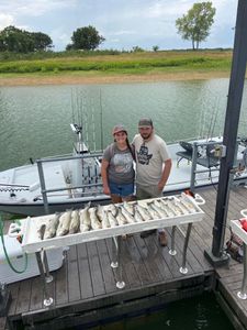 Two people fishing in OK