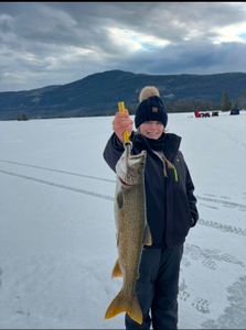 Angler with a big fish at Lake George