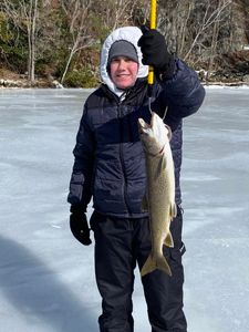 A lone angler fishing at Lake George
