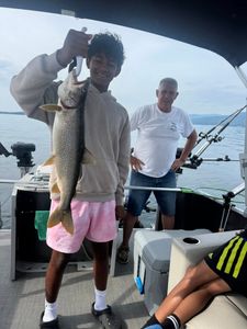 Two people fishing at Lake George for Lake Trout
