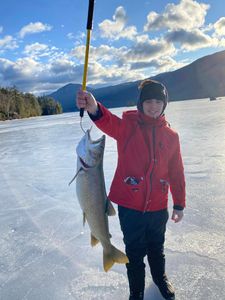 A lone angler fishing at Lake George