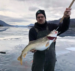 Angler holding a 21-inch fish in NY
