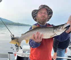 A lake trout measuring 22 inches caught in Lake George while fishing