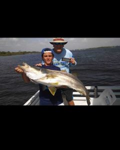 Two anglers fishing on the coast of Florida
