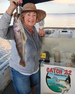 A person fishing at Jensen Beach
