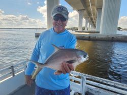 A person fishing in Jensen Beach, Florida for a Florida Pompano