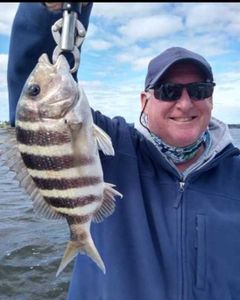Fishing for a sheepshead, 15-inch fish, in Jensen Beach