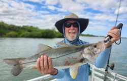 A person fishing for a snook at Jensen Beach
