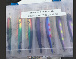 Organized tackle box containing colorful fishing lures in Harrison Township MI