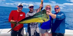 A group of 4 people fishing at Panama City Beach