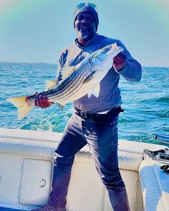 charter fishing New Jersey Striped Bass catcj