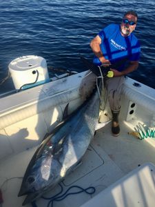 A person fishing with a rod in New Jersey