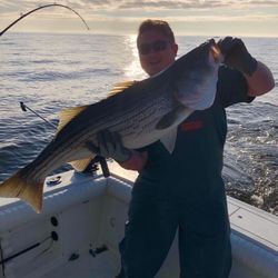 Angler catching a big fish on Port Monmouth Road