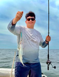 Fisherman with a 14-inch Blue Catfish in NJ