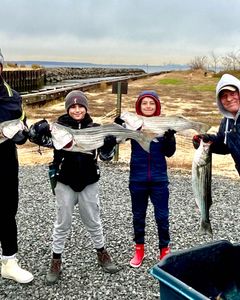 2 striped bass caught on fishing trip at Port Monmouth Road