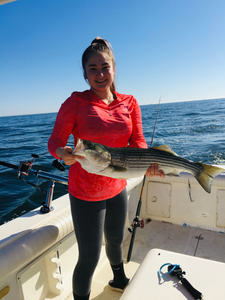 Striped bass caught fishing on boat in Port Monmouth Road NJ waters