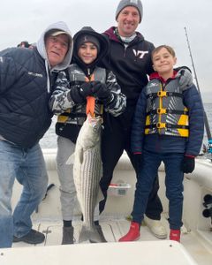 Striped bass caught by 4 people on Port Monmouth Road