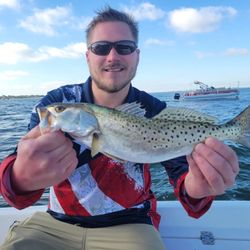 Angler fishing for spotted weakfish in Tampa, Florida