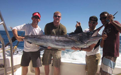 A group of 4 people fishing in the beautiful location of Puerto Plata