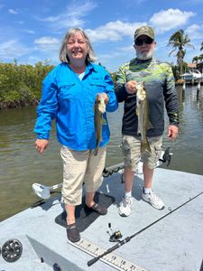 Two snook caught fishing in Punta Gorda FL displayed on boat deck