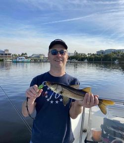 Angler holding a snook fish in Florida