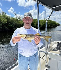 An angler with a snook catch in Punta Gorda