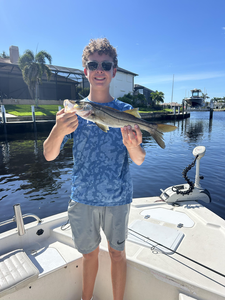 Huge 89-inch Snook hooked with finesse in stormy Punta Gorda!