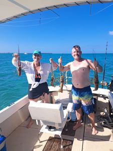 Fresh-caught lobster fun on a sunny Cayman day!