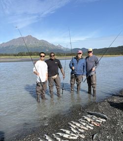 Four people fishing in AK