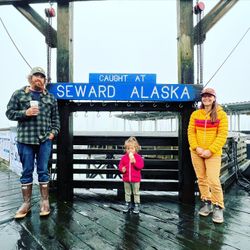 Three people fishing in AK