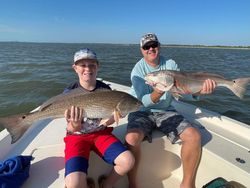 Two redfish caught fishing in Mount Pleasant