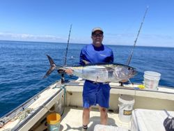 Single fisherman in NH catching a big 38-inch fish