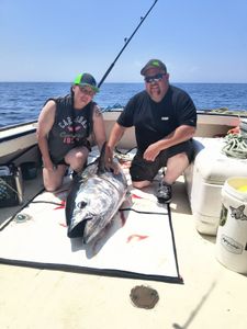 Photograph of a large yellowfin tuna caught while fishing in Hampton