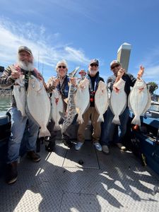 Successful California flounder fishing charter displaying fresh catch in Sacramento CA
