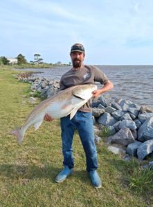 A person fishing in North Carolina