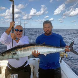 Wahoo fish caught by two people in West Bay