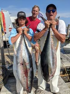 A successful offshore fishing trip, Tuna in hand!