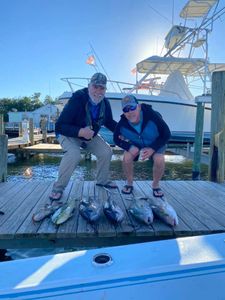 Two people fishing at Fort Pierce