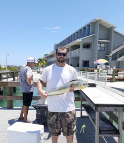 Two people fishing at Fort Pierce