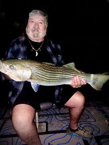 One angler reeling in a big fish in Branson