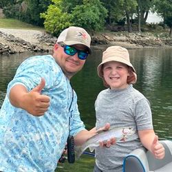 Photograph of a sea trout, 8 inches long, caught while fishing in Branson.