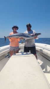 Two people fishing in Destin