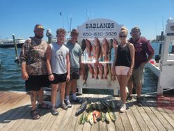 5 anglers fishing in the waters of FL